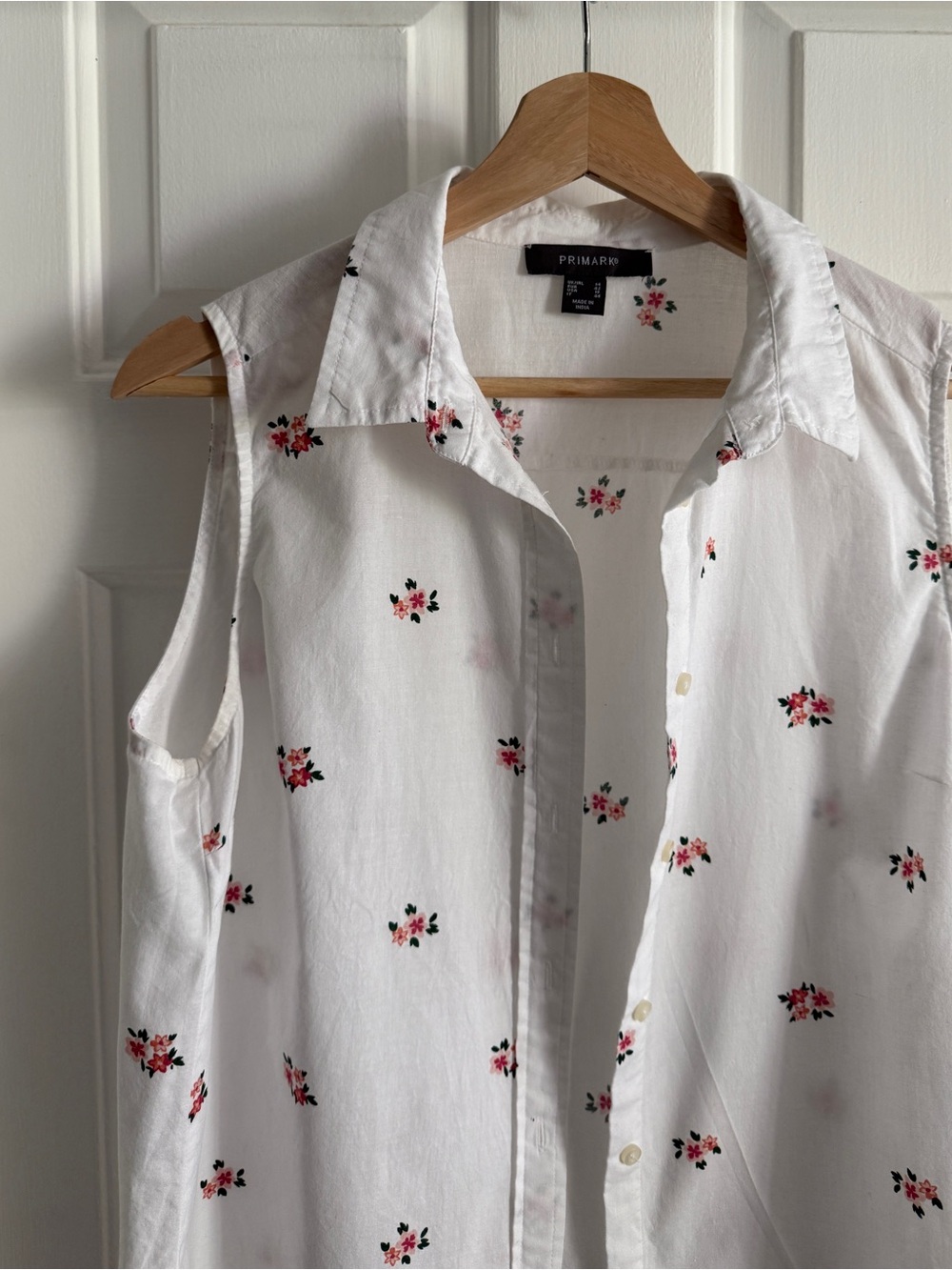 Primark White Sleeveless Button-Front Shirt with Red Floral Print